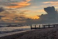 A view along the shore at Worthing, Sussex at sunset Royalty Free Stock Photo