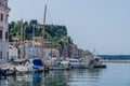 A view along the side of the inner harbour towards the town of Piran, Slovenia Royalty Free Stock Photo