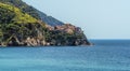 A view along the station platform and coastline at Corniglia, Italy Royalty Free Stock Photo