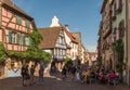 View along a street in the medieval village of Riquewihr, Alsace, France Royalty Free Stock Photo