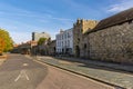 A view along a street with remains of the thirteenth-century town walls in Southampton, UK