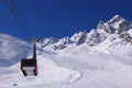 View on alpine downhill slope and lift cabine