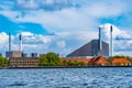 View of Amager Bakke factory with skiing slope on the rooftop in Copenhagen, Denmark