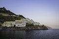 View of Amalfi town at night along the Amalfi coast facing the Mediterranean Sea at sunset, Salerno, Campania, Italy Royalty Free Stock Photo