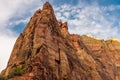 A view of the amazing Angel`s Landing from the canyon floor at Zion National Park, USA against a bright blue sky