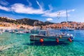 View at amazing archipelago with fishing boats in front of town Hvar, Croatia. Harbor of old Adriatic island town Hvar with Royalty Free Stock Photo