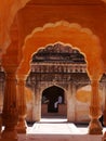 View of amber archways with two men City Palace Jaipur,Rajasthan,India Royalty Free Stock Photo