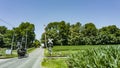 View of An Amish Horse and Carriage Traveling Down a Rural Country Road Royalty Free Stock Photo