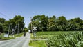 View of An Amish Horse and Carriage Traveling Down a Rural Country Road Royalty Free Stock Photo