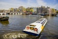 View on Amsterdam and Amstel rive with cruise boats , the Nether