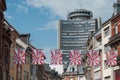 View of ancient buildings in Mulhouse with Europe tower and panoramique restaurant at the top on background