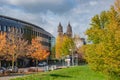 View at ancient Cathedral of Magdeburg and local modern TV broadcast company building MDR during golden Autumn at rainy sky and