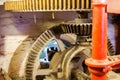 View on ancient gearwheels inside water mill - Maastricht, Netherlands