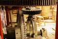 View on ancient gearwheels inside water mill - Maastricht, Netherlands