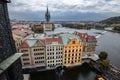 View on ancient Old Town Water Tower, colorful facades of buildings and Vltava river, Prague, Czech Republic