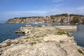 A view of the ancient picturesque town of Ohrid from one of the stone ponds of Ohrid Lake. Royalty Free Stock Photo