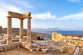 View of the ancient porticos of the temple of goddess linda in Lindos, Rhodes Greece, overlooking the mountains and a surprisingly
