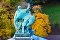 View of the ancient statues man and eagle of stucco and the dome of St. Isaac`s Cathedral Petersburg. Royalty Free Stock Photo