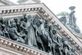 View of the ancient statues of stucco and the dome of St. Isaac`s Cathedral Petersburg Royalty Free Stock Photo