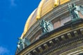 View of the ancient statues of stucco and the dome of St. Isaac`s Cathedral Petersburg. Royalty Free Stock Photo