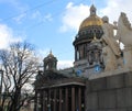 View of the ancient statues of stucco and the dome of St. Isaac\'s Cathedral Petersburg Royalty Free Stock Photo