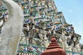 View of Ancient Thai Giant Sculptures Holding Stupa of Wat Arun Ratchawararam