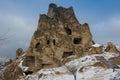 View of ancient Uchisar cave town and a castle of Uchisar dug from a mountains in Cappadocia, Central Anatolia,Turkey Royalty Free Stock Photo