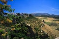 View on ancient village Ronda located on plateau surrounded by rural plains in Andalusia, Spain Royalty Free Stock Photo