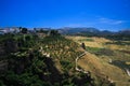 View on ancient village Ronda located on plateau surrounded by rural plains in Andalusia, Spain Royalty Free Stock Photo