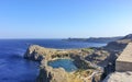 View from the ancient wall of the citadel of the Acropolis of Lindos on St Paul`s Bay and the ocean. Rhodes. Greece Royalty Free Stock Photo