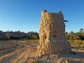 A view of an ancient watch tower and a talus