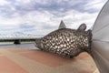 View of the anniversary celebration sculpture of a large metal salmon in the city center of Tornio