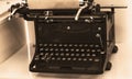 View of an antique manual Underwood typewriter on sepia Royalty Free Stock Photo