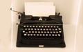 View of an antique manual Underwood typewriter on sepia Royalty Free Stock Photo