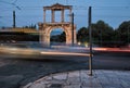 View of the antique portal during sunset with colorful light trace from night traffic in Athens in Greece - low light Royalty Free Stock Photo