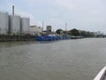 View of barges docked in an industrial area along the Pasig river, Manila, Philippines