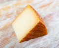 View of a piece of semi-hard cheese