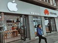 a view of apple cell phone store and Huawei mobile phone store in Wuhan city Royalty Free Stock Photo