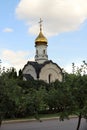 View from the apple orchard to the Chapel of St. Basil the Great on the territory of VDNKh Park