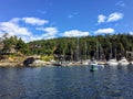 A view from an approaching boat outside the busy Otter Bay marina, on North Pender Island, British Columbia, Canada.