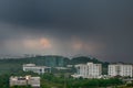 View of approaching rain storm, rainy clouds over the city, poor weather forecast. Royalty Free Stock Photo