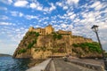 View on Aragonese castle at sunset, Ischia, Italy