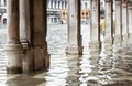 View of the arcades with high water in Venice.