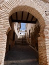 View through arch in the back streets of Jewish quarter in Toledo, Castile La Mancha, Spain. Royalty Free Stock Photo