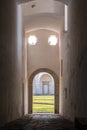 View through arch into the cloister at Certosa di San Giacomo, also known as the Carthusian Monastery, on island of Capri, Italy.