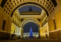 View of Arch of General Staff Building on Bolshaya Morskaya Street to Palace Square in Saint Petersburg city in night Royalty Free Stock Photo