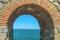 View from the arch to the Black Sea in Sozopol, Bulgaria. Royalty Free Stock Photo