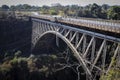 View of the arched bridge of Victoria Falls over the Zambezi River Royalty Free Stock Photo