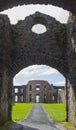 A view through the arched courtyard gates of the Bishop`s Mussenden House on the Downhill Demesne at Castlerock, Northern Ireland