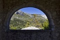 View through arched window of Chapel De Notre Dame, Bargeme, The Var, France Royalty Free Stock Photo